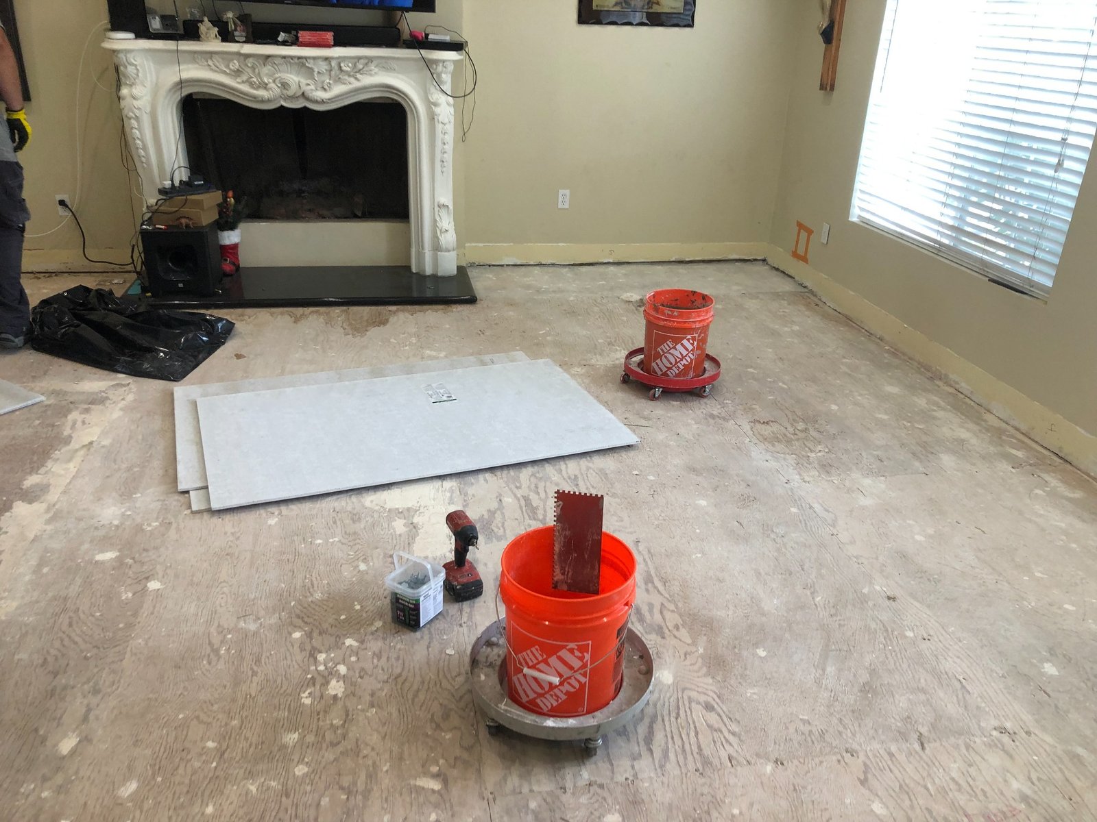Interior floor after old flooring removal before large-format tile installation