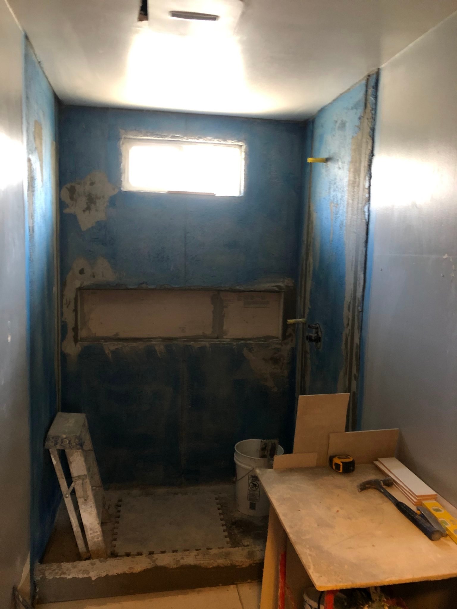Custom shower during waterproofing and preparation before tile installation